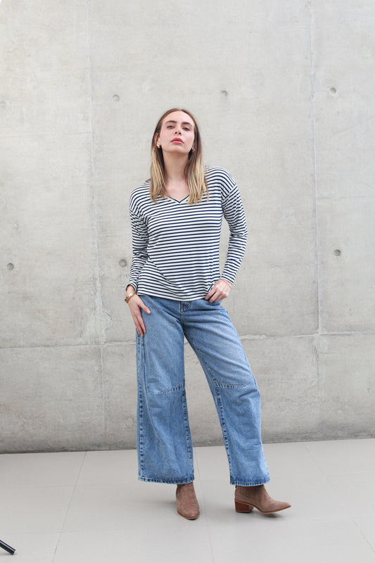 Polo manga larga cuello V a rayas